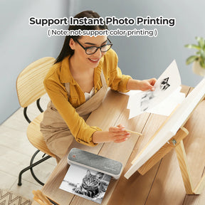 MUNBYN inkless A4 portable printer supports instant monochrome photo printing.