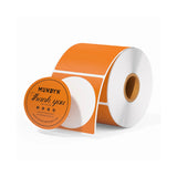 Roll of round orange thermal thank you stickers for packaging and shipping labels