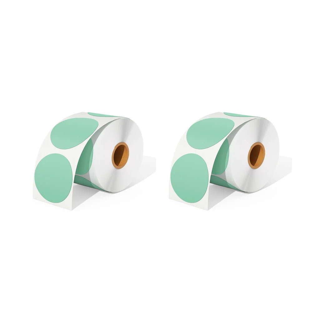 Two rolls of green thermal circle labels