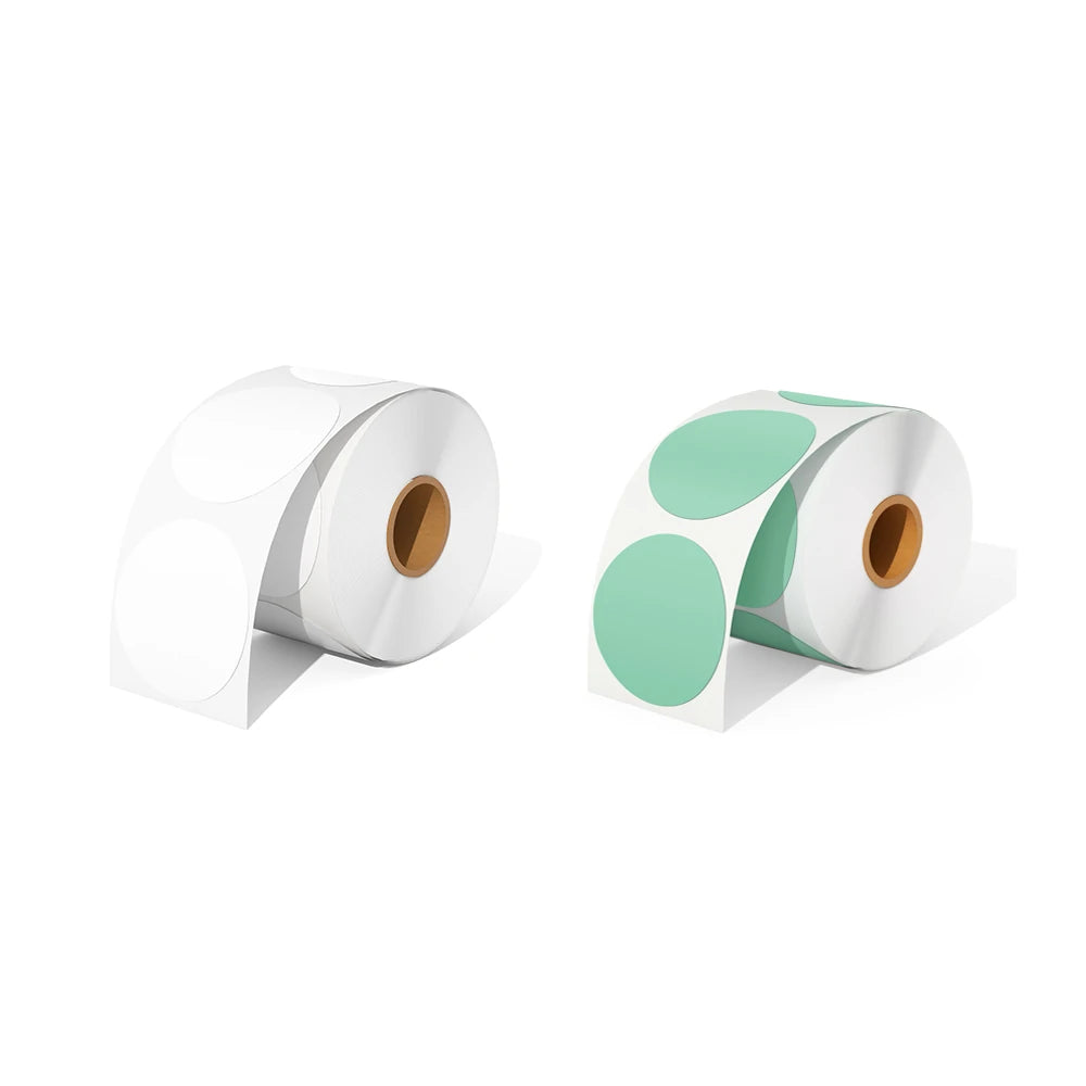 A roll of white circle thermal labels and a roll of green circle thermal labels